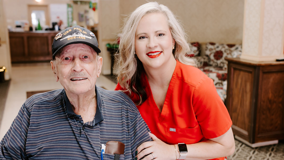 Staff with Veteran Elder at Conway Healthcare and Rehabilitation Center